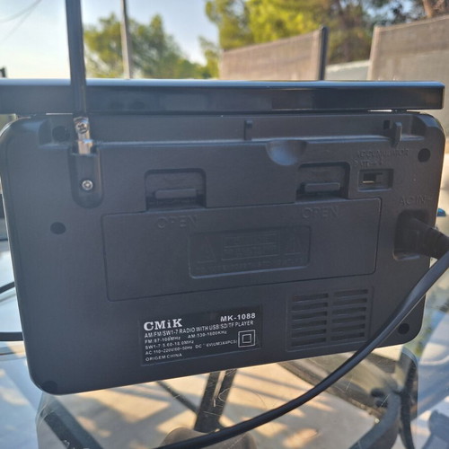 CMiK portable radio with flashlight and AUX cable