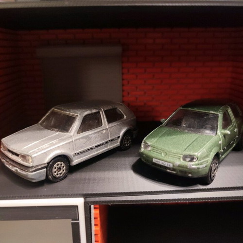 Golf 1/56 and Golf IV GTI 1/57 used, set of 2 toy cars