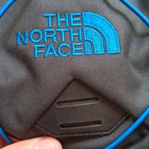 The North Face backpack brand new, black and blue