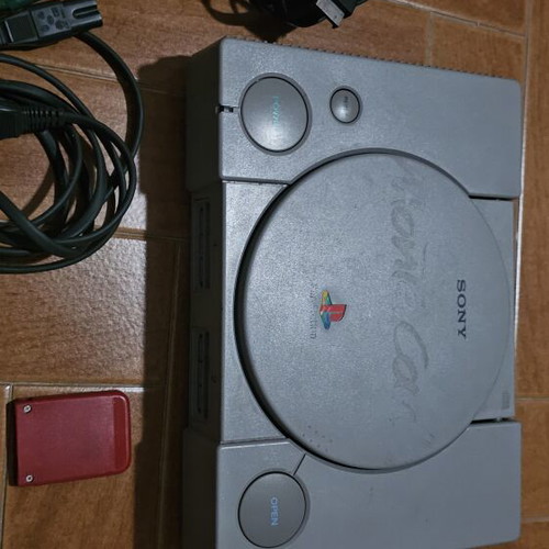 PlayStation 1 console with 2 controllers