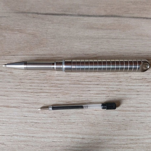 Mini titanium pen like new with Frag Pattern and carbide tip
