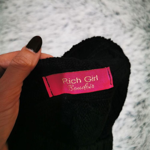 Black turtleneck sweater with one sleeve like new