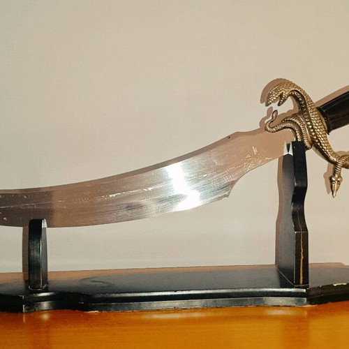 Decorative Gothic sword like new with wooden base