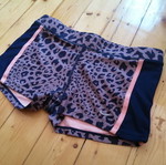 Nike Dri-FIT women's short leggings with leopard print, size S