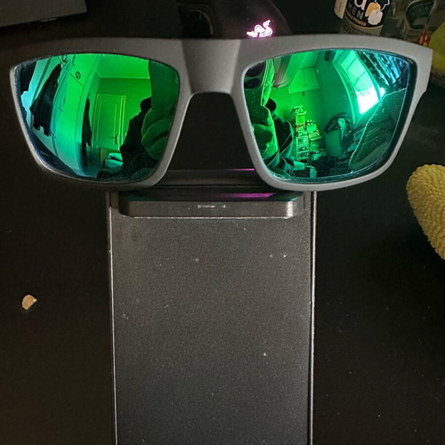 Polarized sunglasses new with green lens and black frame