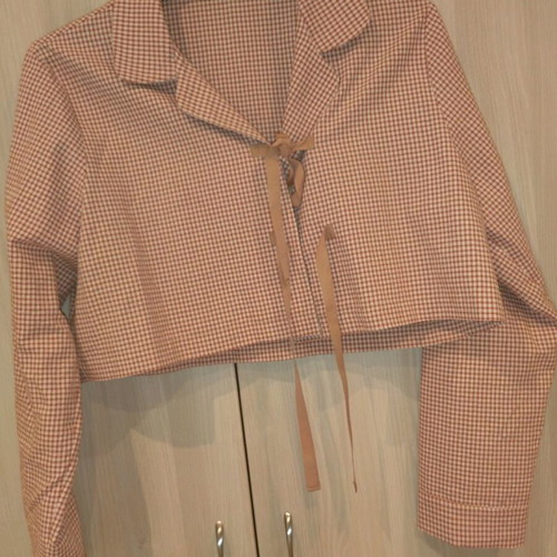 Milkwhite set new with medium shirt and small skirt