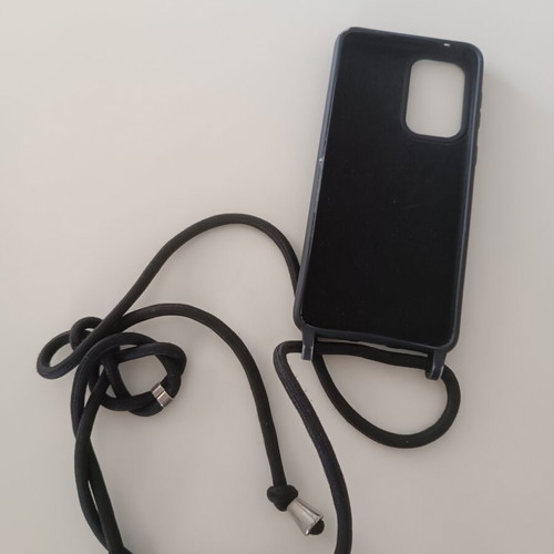 Samsung Galaxy A33 5G case with strap used, black