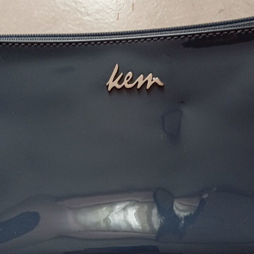 Kem bag wallet unused, shiny gray