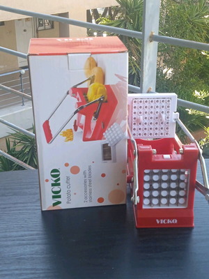 Potato cutter used with suction base and 2 attachments
