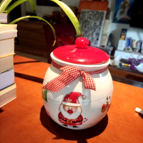Christmas ceramic cookie jar like new with embossed decorations