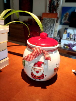 Christmas ceramic cookie jar like new with embossed decorations