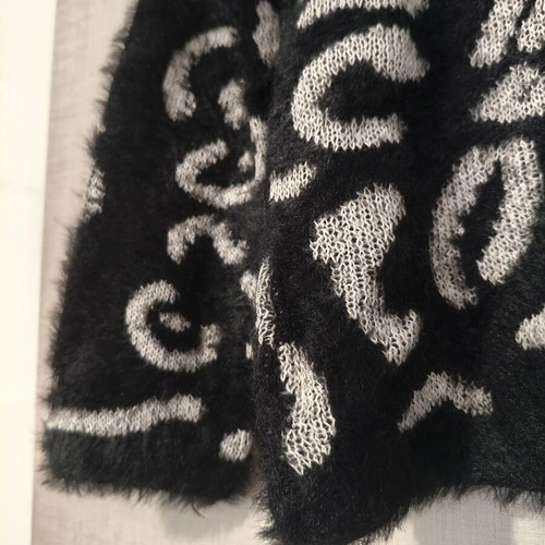 Women's Leopard Print Fluffy Knit Sweater size S/M like new