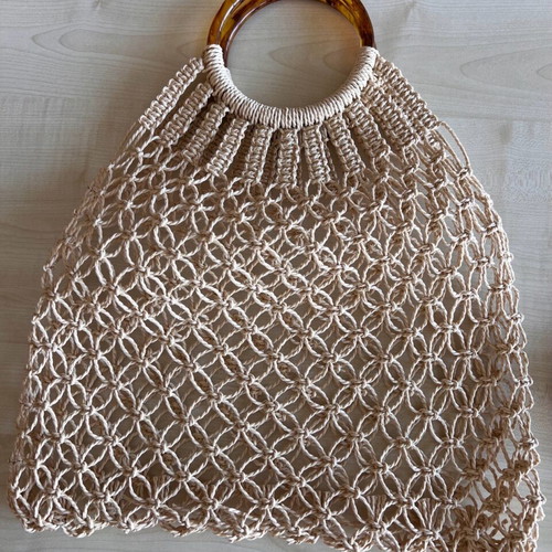 Raffia bag like new with tortoiseshell handle and cotton interior