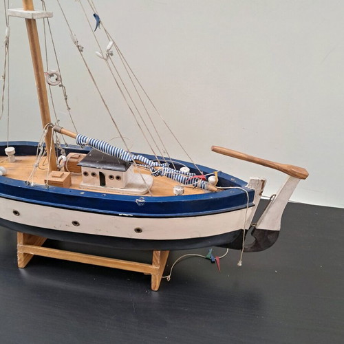 Wooden collectible ship from 1960 used with stand