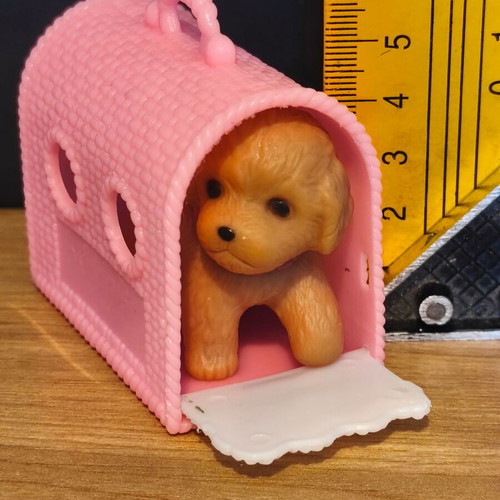 Pink pet carrier and dog toy used, very good condition