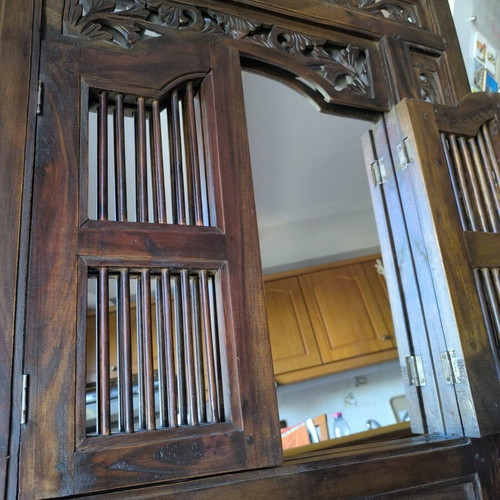 Wooden carved mirror with opening shutters like new