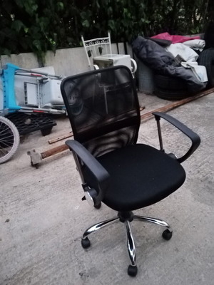 Office chair with arms used, anthracite mesh