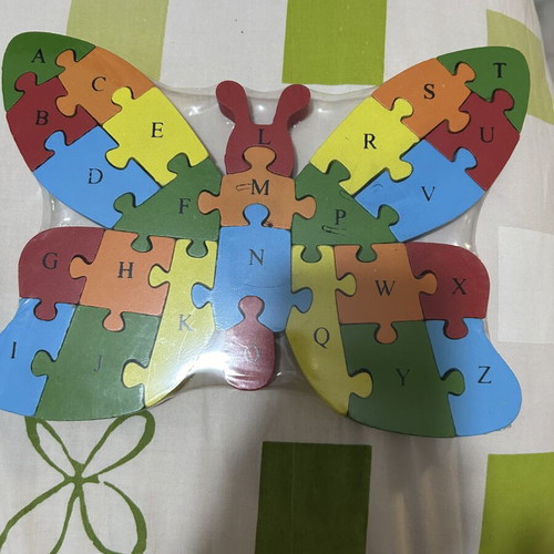 Wooden puzzle with numbers and English letters, new