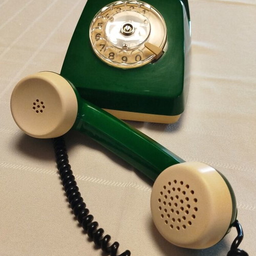 Old green wired telephone, functional