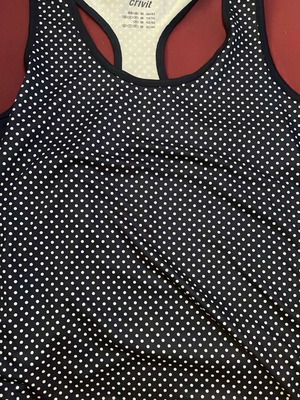 Sports sleeveless polka dot top like new, size M-L, black and blue
