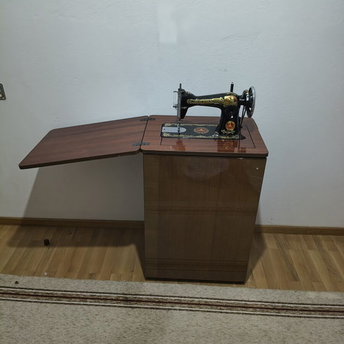 Mercedes vintage sewing machine with cabinet, treadle, like new