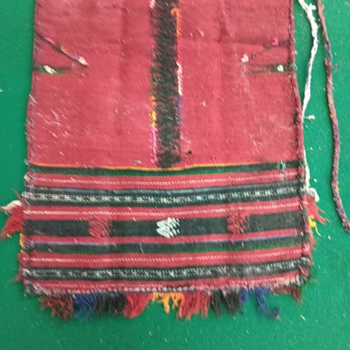 Red striped traditional costume apron used with wear