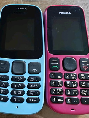 Nokia TA-1034 blue and RY130 pink phones like new with charger