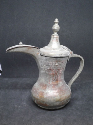Antique copper coffee kanati used with engraved oriental designs