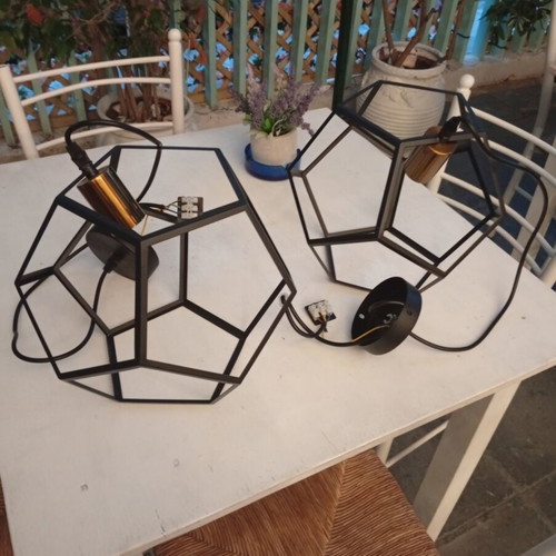 Two rhombic metal ceiling lights