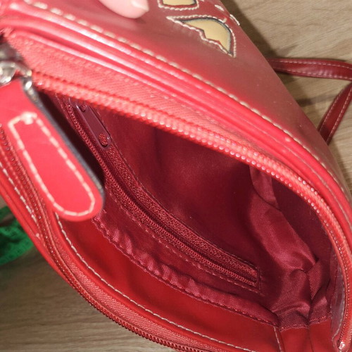 Leather red shoulder bag with tulip embroidery used