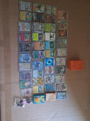 Pokemon card collection new, over 600 cards with Charizard box and accessories