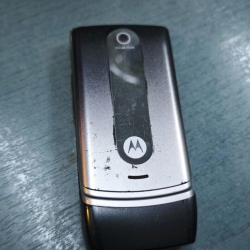 Motorola W 377 cell phone used, non-functional, silver