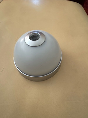 Alarm clock with light used, projects time on ceiling