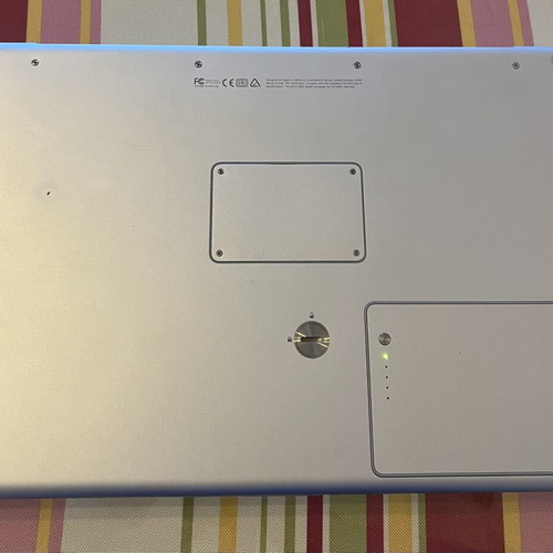 Apple PowerBook G4 15-inch laptop with original charger