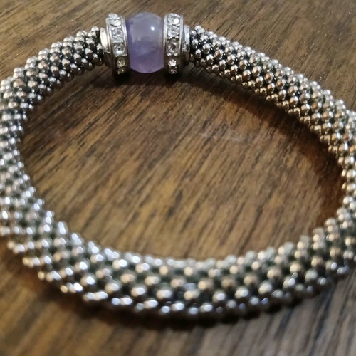 Women's bracelet with purple stone and white gems like new