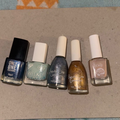 Nail polishes new, pack of 5 with blue, gold and nude shades