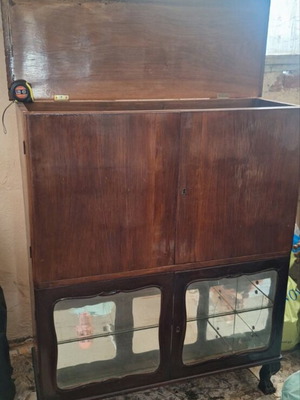 Vintage 1950s wooden cabinet with glass display