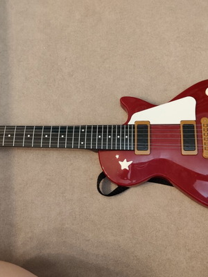 Toy guitar for small children, musical buttons