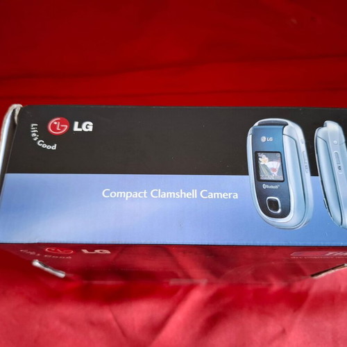 LG F2400 mobile phone packaging like new with charger and manual