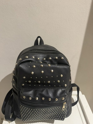 Women's backpack with decorative studs, 2 side pockets, large interior