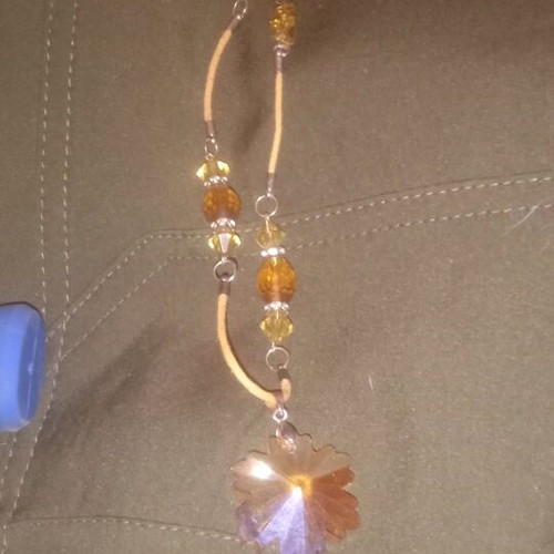 Handmade necklace with amber beads and leaf pendant
