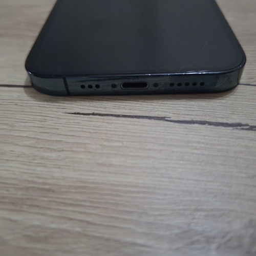 iPhone 12 Pro smartphone with 80% battery health, case included