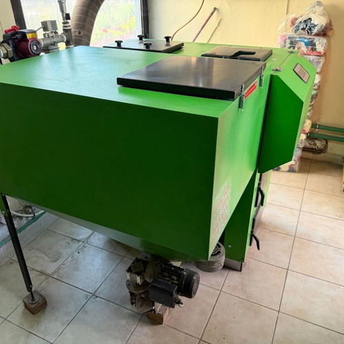 Pellet Boiler like new with external temperature control and hot water mechanism