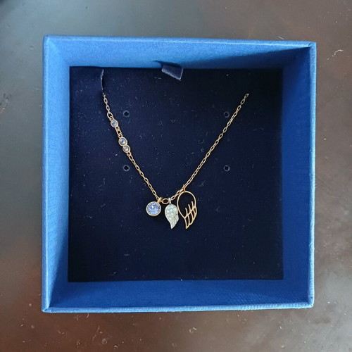 Swarovski necklace in rose gold, like new