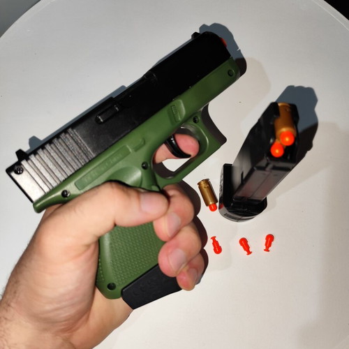 G26 9x19 Semi-Automatic Toy Pistol new with 6 shells and 20 plastic bullets