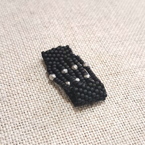 Handmade ring with black matte and silver polyhedral beads
