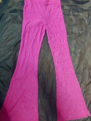Set in fuchsia color with embossed designs, like new