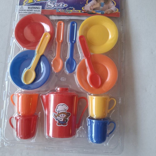Toy Kitchen Set like new with tea set luggage and utensils