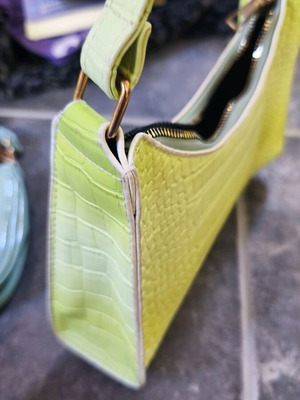 Green used handbag