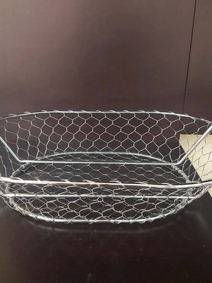 Metal fruit basket new, length 46 cm and width 24 cm